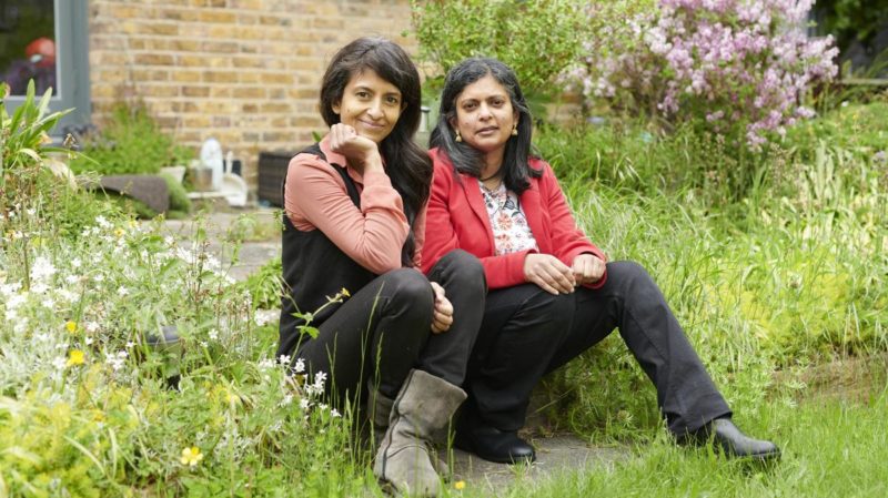 Konnie, left, 46, and Rupa, 49, in Konnie’s garden in west London (Photo credit: PAUL STUART FOR THE SUNDAY TIMES MAGAZINE)